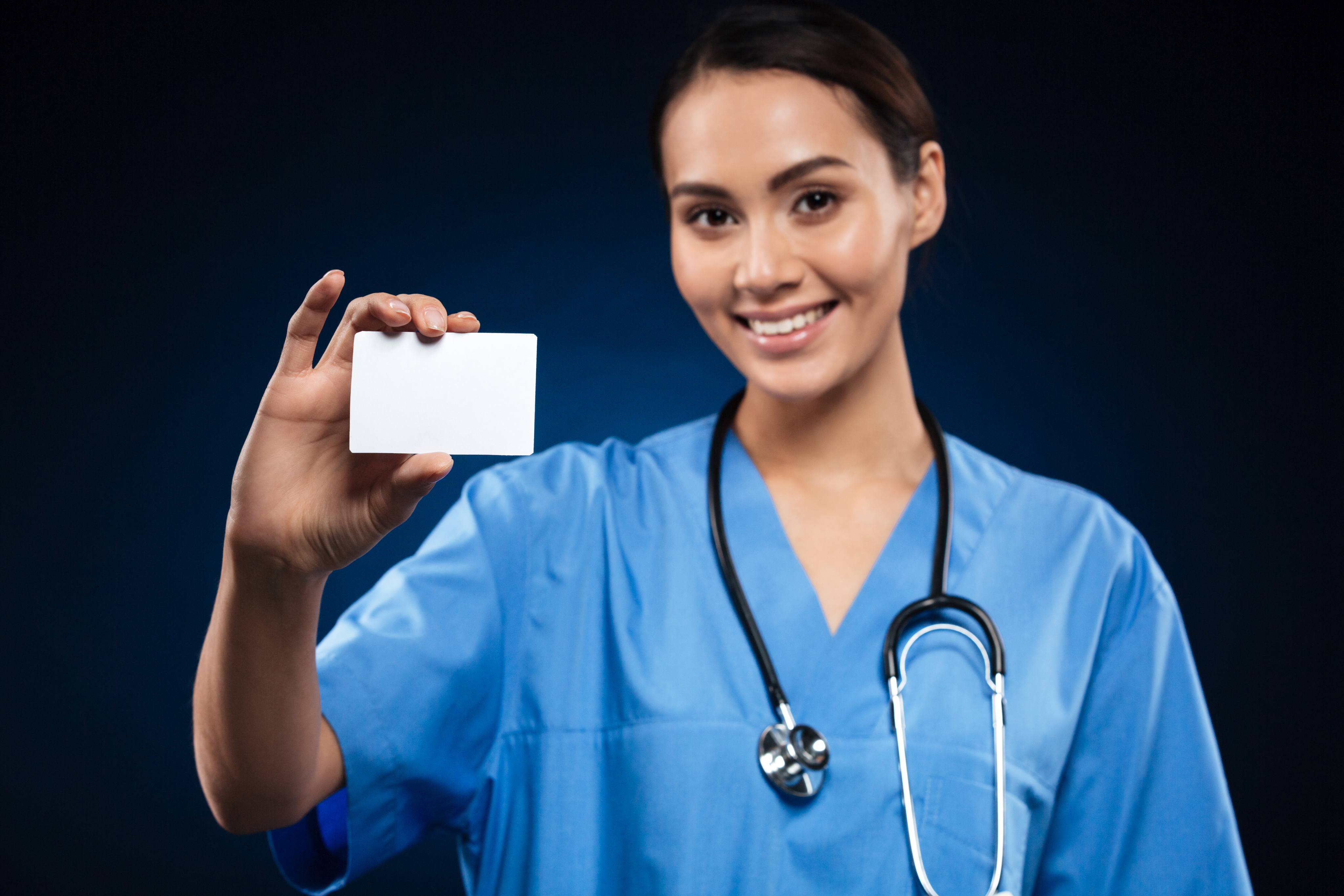 Doctor showing member ID card